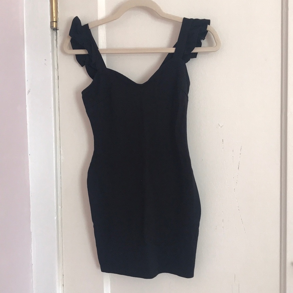 Black body con dress with ruffled sleeves